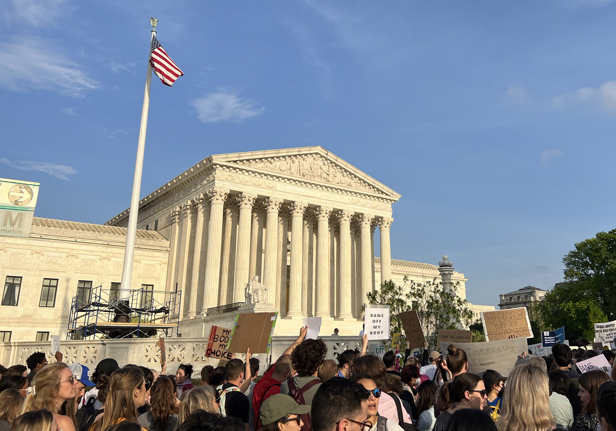 Protesters rally outside the U.S. Supreme Court on May 4, 2022.