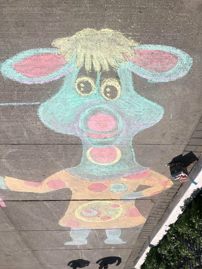 Photo of Polkaroo done as a drawing with sidewalk chalk