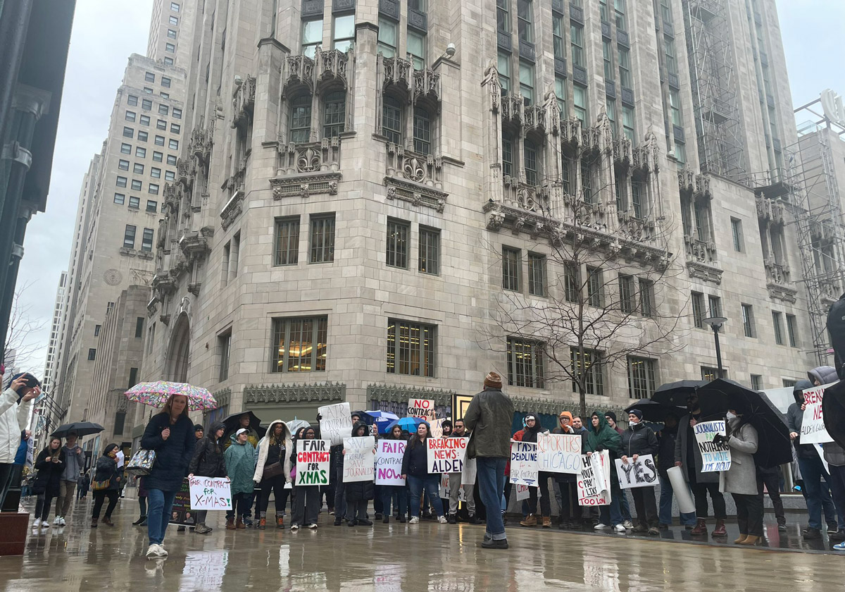 Chicago Tribune workers rally outside Tribune Tower in December 2023