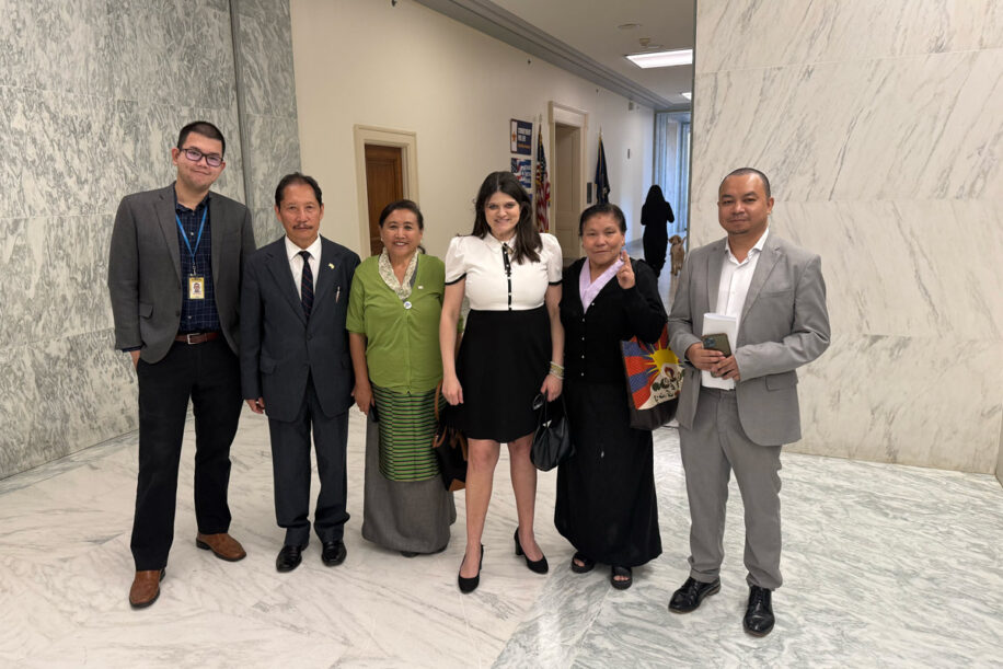 Radio Free Asia Guild members pose for a photo with Representative Hayley Stevens on Capitol Hill while advocating for continued funding of the news service.