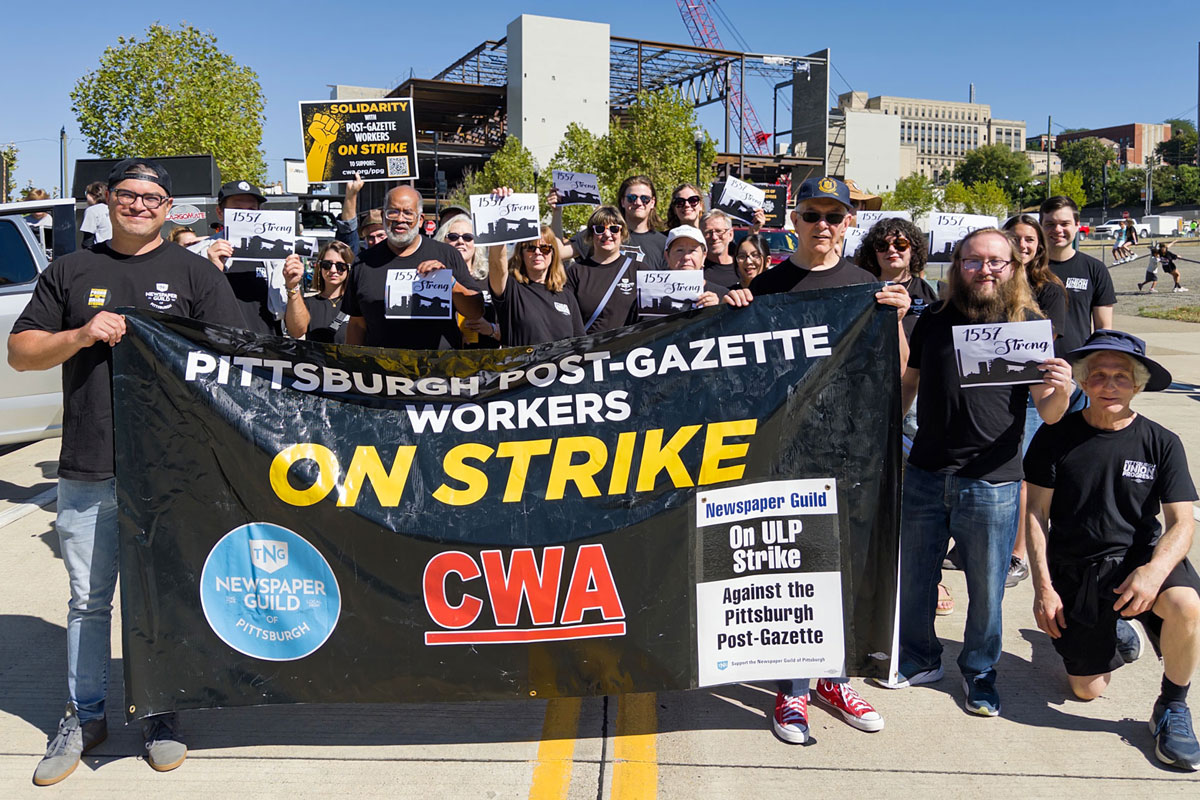 Pittsburgh Post-Gazette strikers pose at the 2025 Pittsburgh Labor Day Parade
