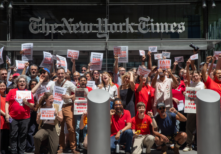 Unionized staff at the New York Times protest in front of the company's offices in NYC.